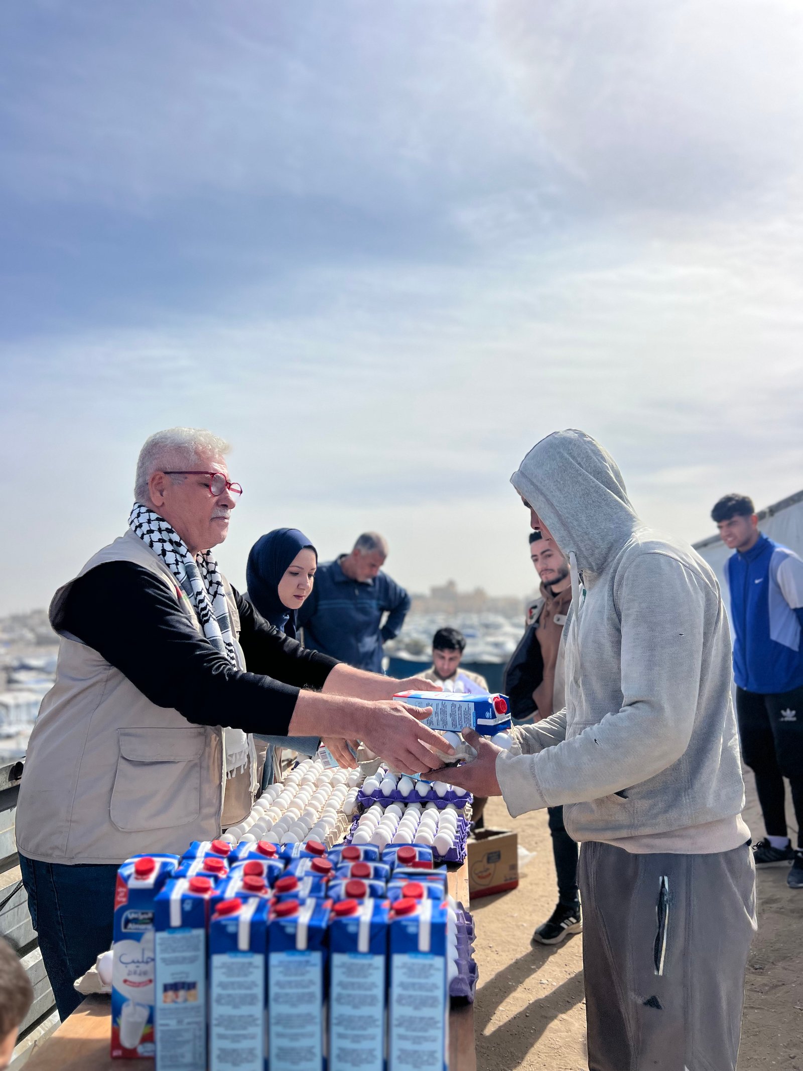 Distribution Egg and Fresh Milk for Displaced Families in Khan Younis Camps image 3