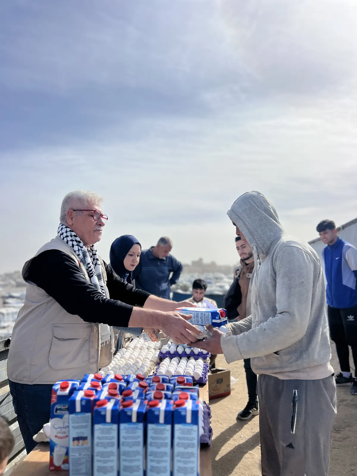 Distribution Egg and Fresh Milk for Displaced Families in Khan Younis Camps image 3
