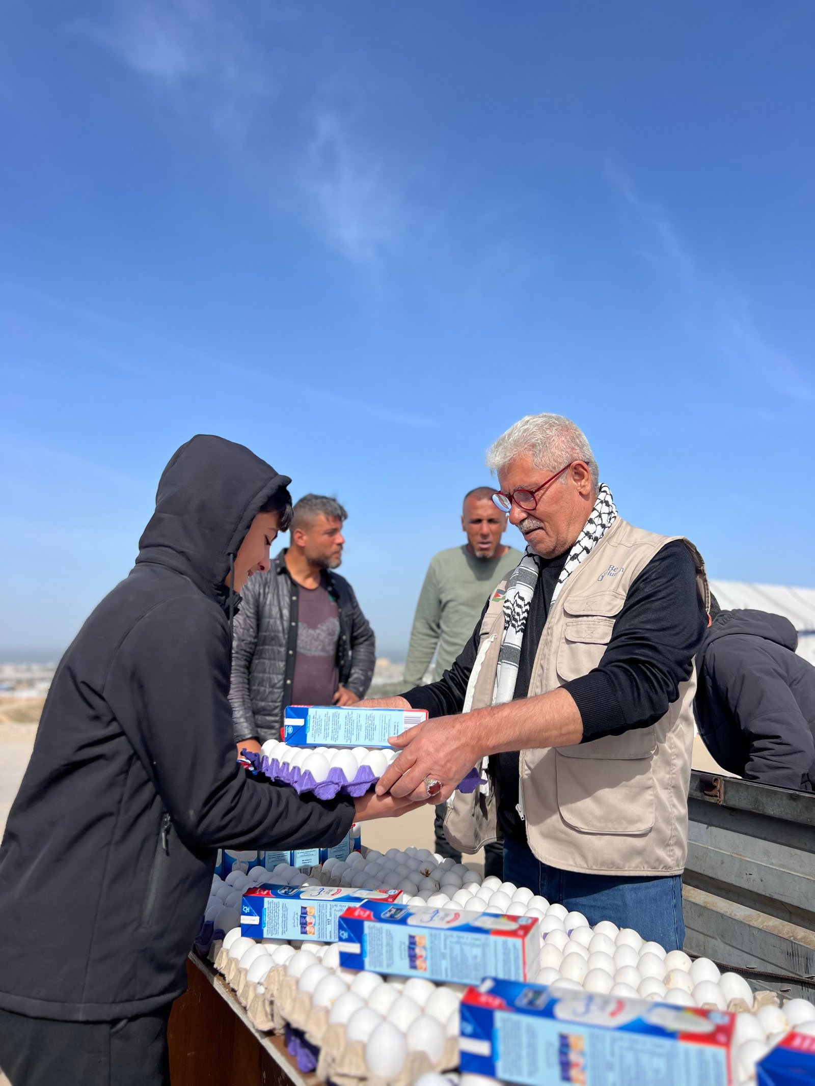 Distribution Egg and Fresh Milk for Displaced Families in Khan Younis Camps image 5
