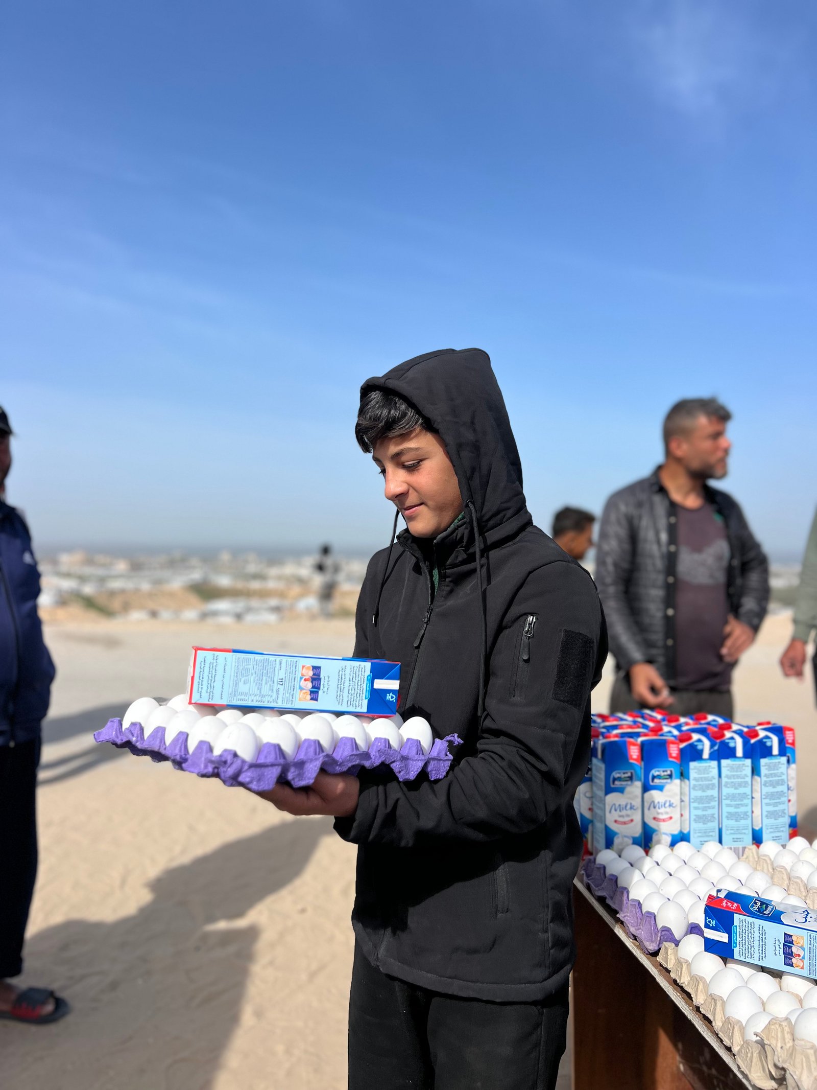 Distribution Egg and Fresh Milk for Displaced Families in Khan Younis Camps image 6