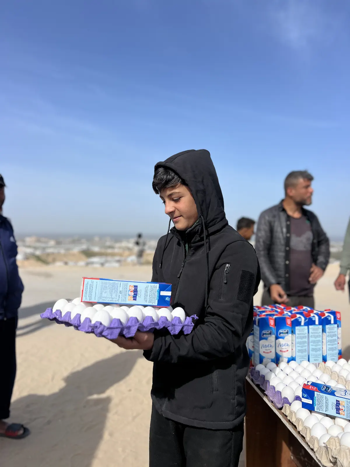 Distribution Egg and Fresh Milk for Displaced Families in Khan Younis Camps image 6