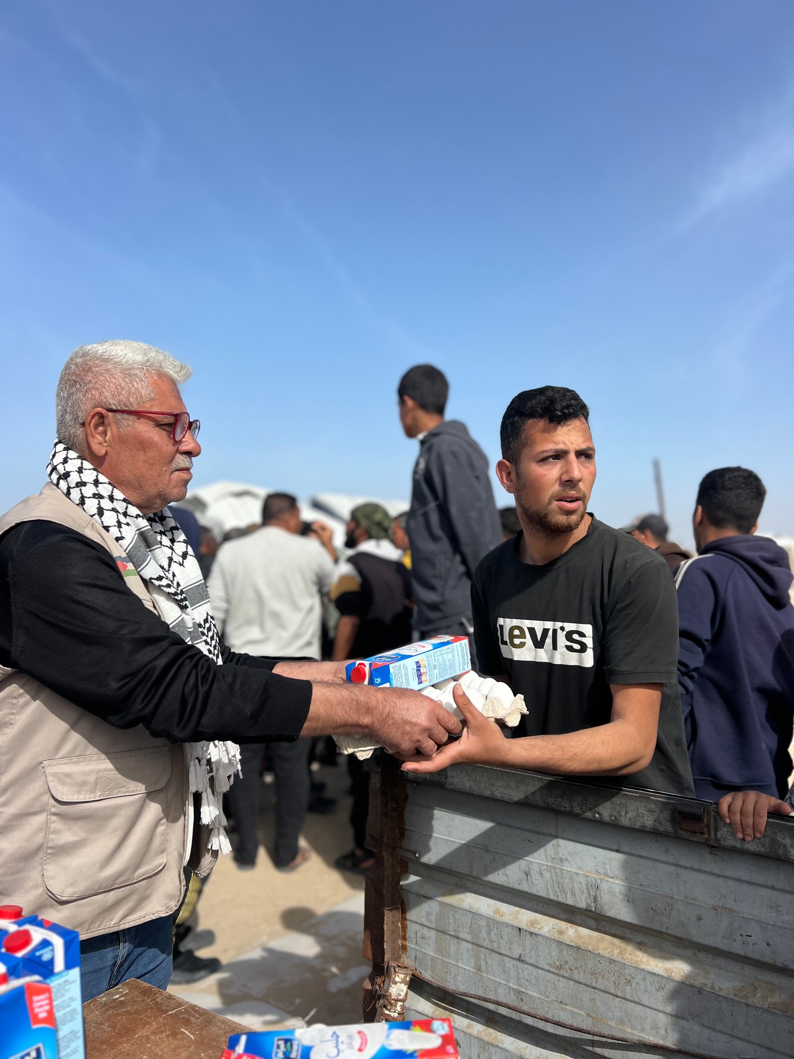 Distribution Egg and Fresh Milk for Displaced Families in Khan Younis Camps image 9