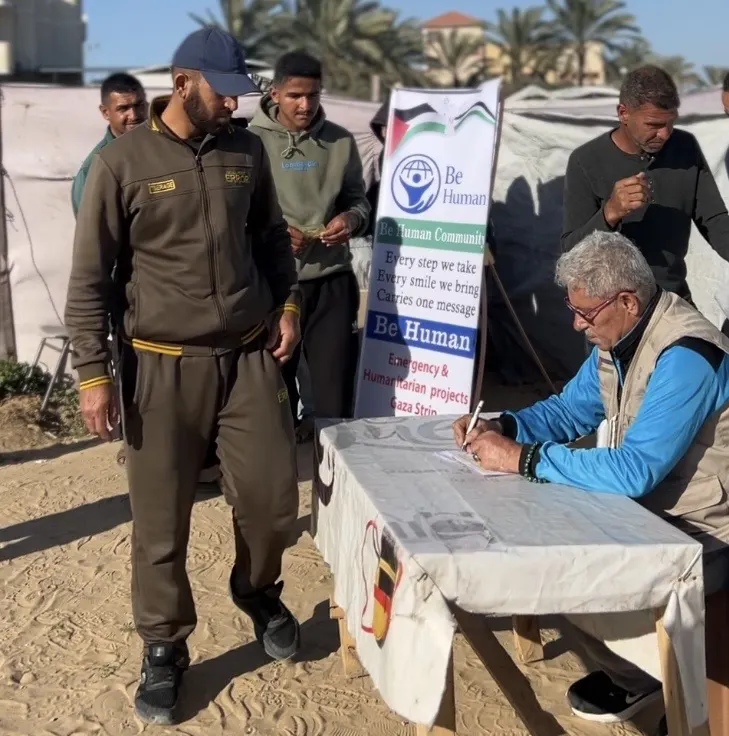 Distribution of Food Parcels for Displaced Families - Deir Al-Balah, Gaza image 1